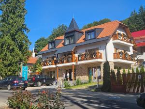 a building with bikes on the balconies of it at Vila Salt & Soul in Sovata