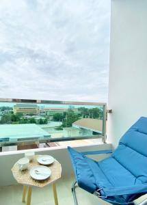 Et opholdsområde på เดอะซันเซ็ท บางแสน Exclusive Top Floor
