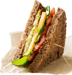 een doormidden gesneden sandwich op een stuk papier bij Shehab Dahab in Dahab +13 foto's