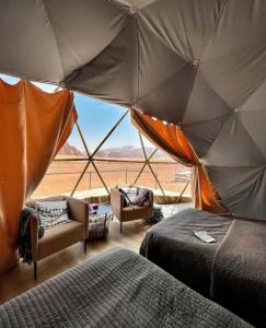 En eller flere senge i et værelse på Rum STAR LUXURY Camp &JEEP Tours + 53 billeder