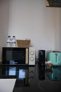 Kuchyň nebo kuchyňský kout v ubytování VIELA Guest House T2 + 12 fotografií