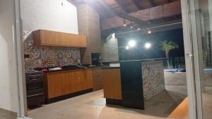 Køkken eller tekøkken på Recanto do Sol Bragança Pta SP + 6 billeder