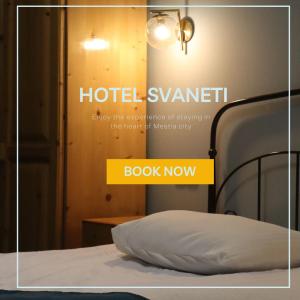 ein Poster eines Bettes mit einem Swanitt-Hotelschild in der Unterkunft Hotel Svaneti in Mestia + 45 Fotos