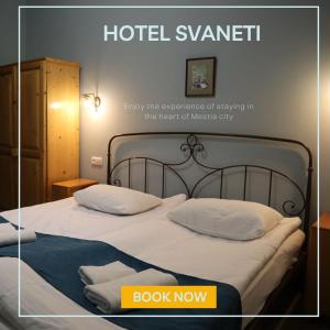 een hemelbed in een hotelkamer bij Hotel Svaneti in Mestia +47 foto's
