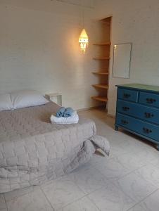 En eller flere senge i et værelse på Casa Boreal dptos estilo casa