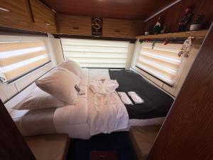 Giường trong phòng chung tại Camper Elegance Uyuni