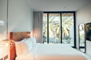 Postel nebo postele na pokoji v ubytování CALIXTA Hotel + 108 fotografií