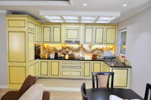 Køkken eller tekøkken på The White Villa