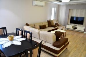 Et tv og/eller underholdning på The White Villa