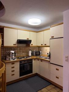 Kuchyň nebo kuchyňský kout v ubytování Ferienhaus Allgäu in Center Parc Nähe - Stadtnah - Parkplatz - Balkon + 7 fotografií