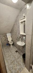 Koupelna v ubytování Vila Ivanović + 25 fotografií