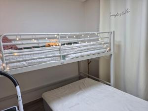 En eller flere senge i et værelse på 달빛누리