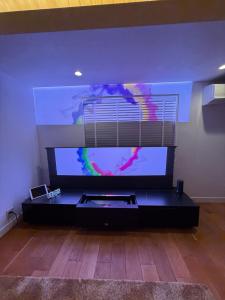 Et tv og/eller underholdning på Smile House Akiya