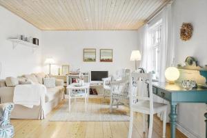 a living room with a couch and a table at 872-Bedsted-Thy-Lyngbyvej-25 in Bedsted Thy