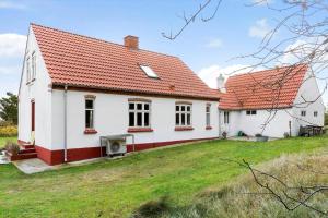 a white house with an orange roof at 872-Bedsted-Thy-Lyngbyvej-25 in Bedsted Thy