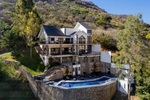 an aerial view of a house on a cliff at CASONA San Geronimo in Atotonilco el Alto