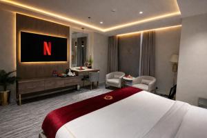 Postel nebo postele na pokoji v ubytování Taj Executive Boutique Hotel - Central F-7 Islamabad