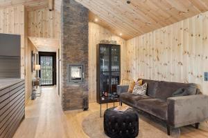 a living room with a couch and a table at 157-Thisted-Isfuglevej-17 in Thisted
