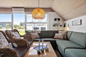 a living room with a couch and chairs at 332-Thisted-Kristinesvej-32 in Thisted
