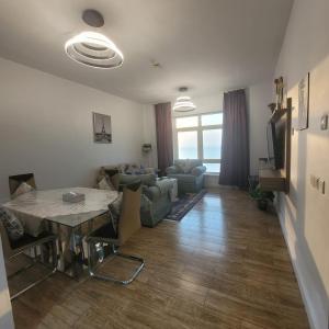 Posezení v ubytování Royal Beach Apartment + 20 fotografií