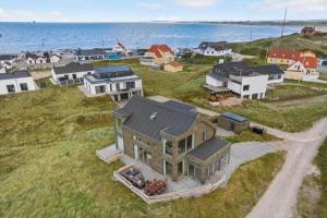 an aerial view of a house and the ocean at 1053-Thisted-Kraenhavs-Sti-8 in Torsted