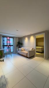 En eller flere senge i et værelse på Mar à Vista