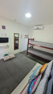 Et tv og/eller underholdning på Di Pipa Rooms - Hidromassagem Externa