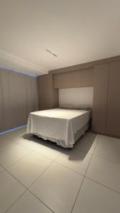 En eller flere senge i et værelse på Mar à Vista