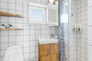 a bathroom with a sink and a toilet at 204-Vestervig-Lodbjergvej-4 in Vestervig +17 photos