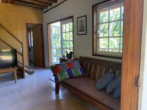 Et opholdsområde på Casa da mata- Vista linda pra mata e jardim privativo