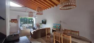a living room with a couch and a table at Grace’s House, Ezeiza Airport in Monte Grande