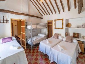 En eller flere senge i et værelse på Holiday Home in Archidona with private pool + 23 billeder