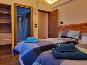 En eller flere senge i et værelse på Cá du Mattu