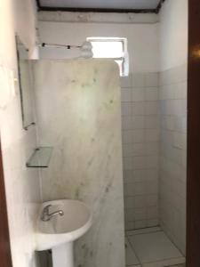 Et badeværelse på Potyra Guest House