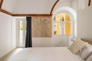 En eller flere senge i et værelse på Schloss Locarno - Self Check-In + 152 billeder