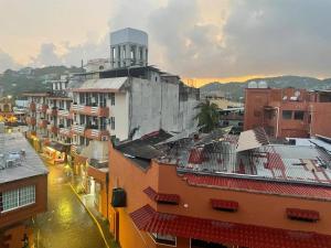 an overhead view of a city with buildings at Loft Rayito de Sol, Zihuatanejo Center with AC in Zihuatanejo