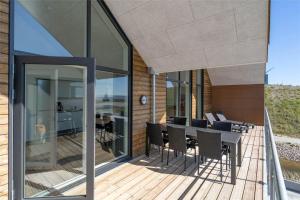 En balkon eller terrasse på 906-Hvide-Sande-Langsand-116-1-sal