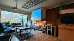 Et tv og/eller underholdning på Hostal Punto Rockstar