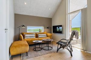 Et tv og/eller underholdning på 920-Hvide-Sande-Langsand-115-1