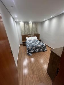 En eller flere senge i et værelse på Sobrado oásis central