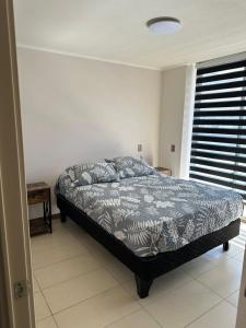 En eller flere senge i et værelse på condominio azul 1 + 4 billeder