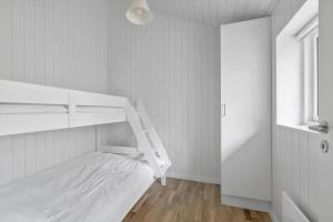 En eller flere senge i et værelse på 2309-Stege-Enebaerstien-39