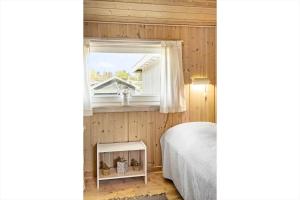 En eller flere senge i et værelse på 7025-Bogo-By-Sejlet-20