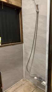 Et badeværelse på 富士見旅館101