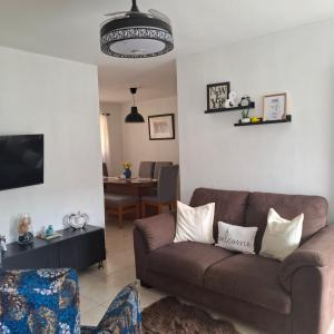 Posezení v ubytování Residencial Palmas De Gurabo