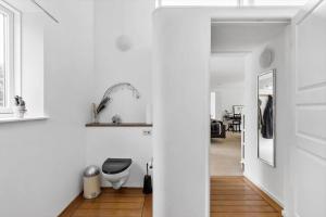 TV a/nebo společenská místnost v ubytování 8148-Praesto-Anemonevej-8