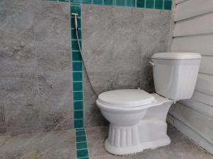 Koupelna v ubytování Totò Pizza Bungalows and Sea View Restaurant