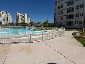 Bazén v ubytování Vacaciones Playa y Faro La Serena nebo v jeho okolí + 9 fotografií