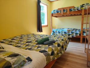 En eller flere senge i et værelse på The Sandcastle