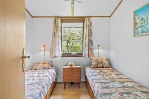 En eller flere senge i et værelse på R845-Rodvig-Maelskifterne-51